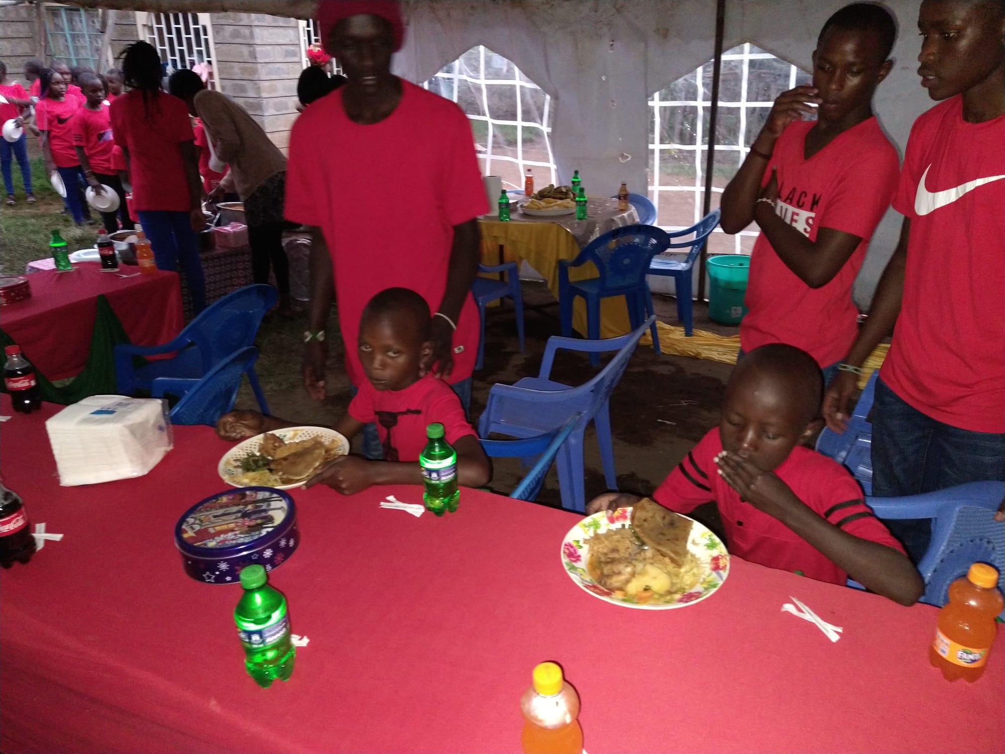 Christmas feastin with line of children.jpg