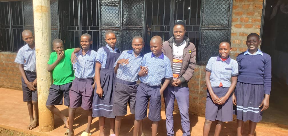 P6 teacher students outside.jpg