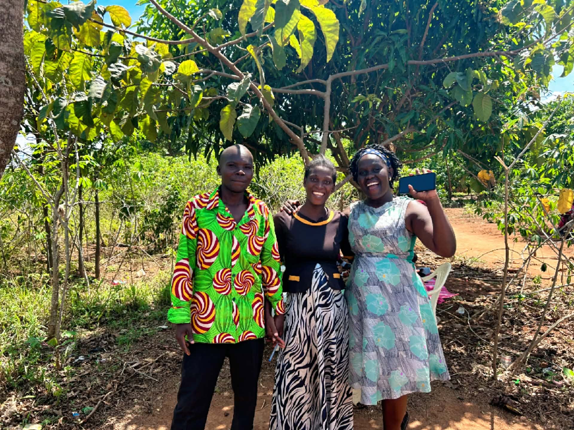 Pastor Jeremiah and his wife Joan with Gloria Erumu